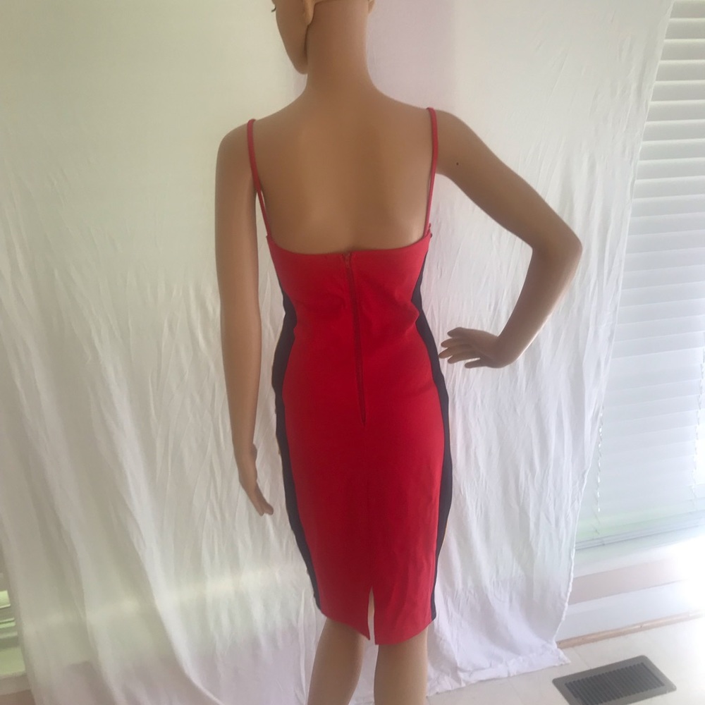 Brand new, never worn red, black and gold dress.